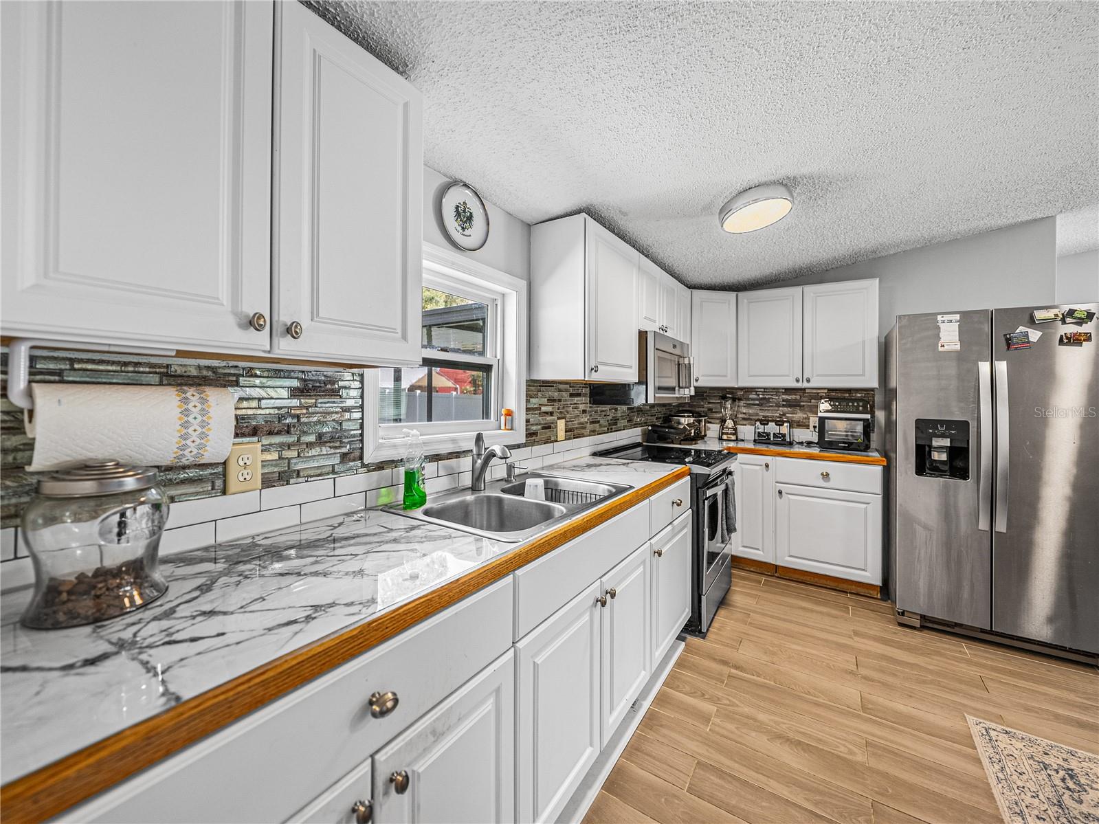 4943 ROLLINGLEN LOOP E — photo 13