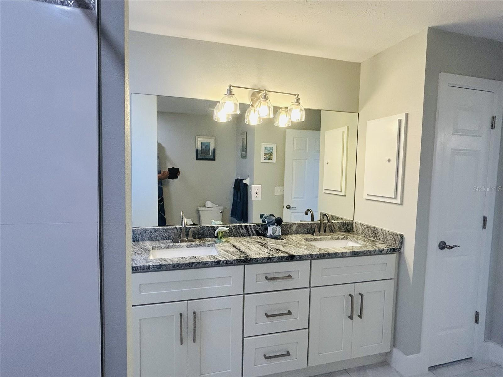 9709 SE SUNSET HARBOR RD — photo 15