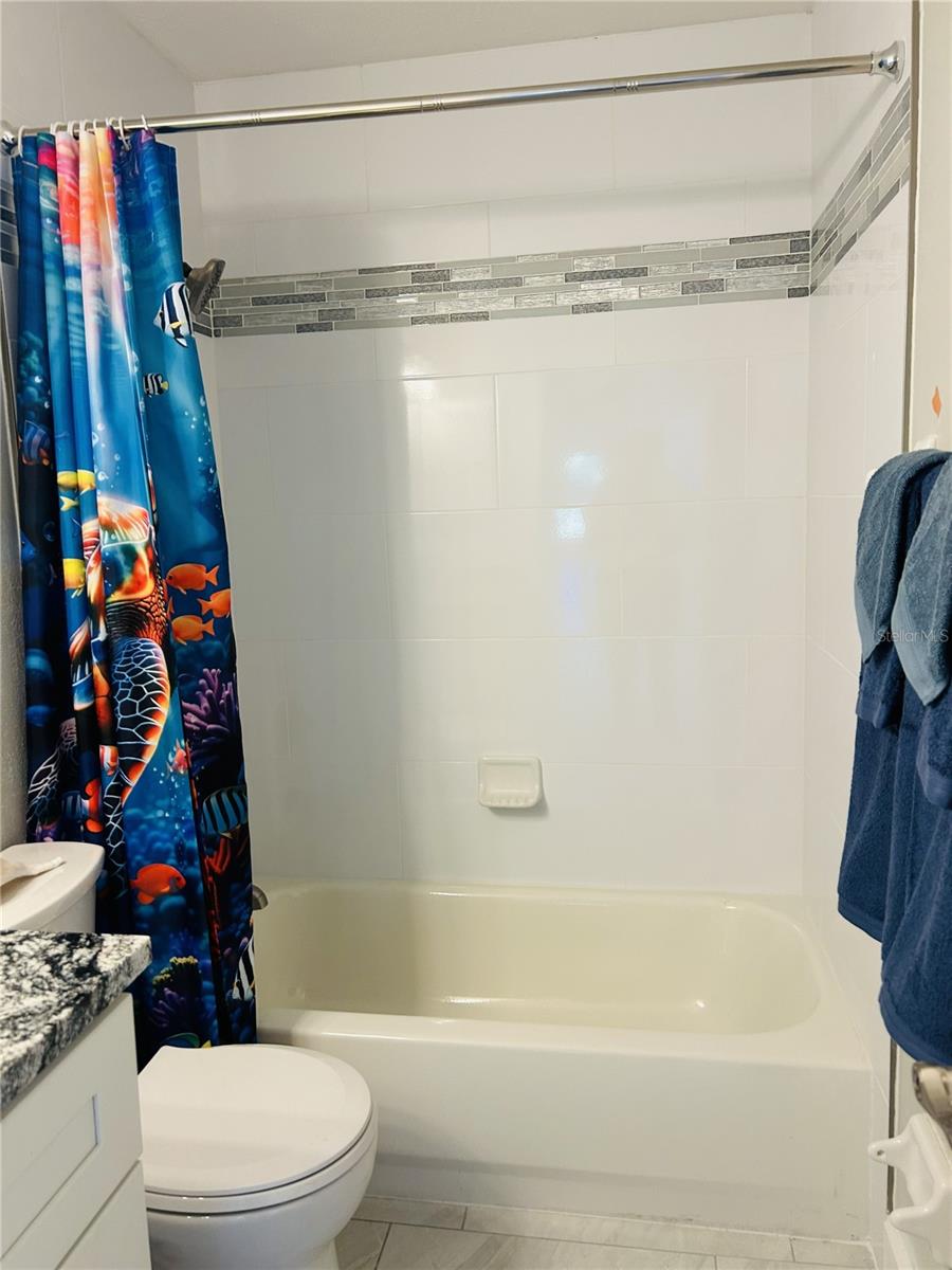 9709 SE SUNSET HARBOR RD — photo 23