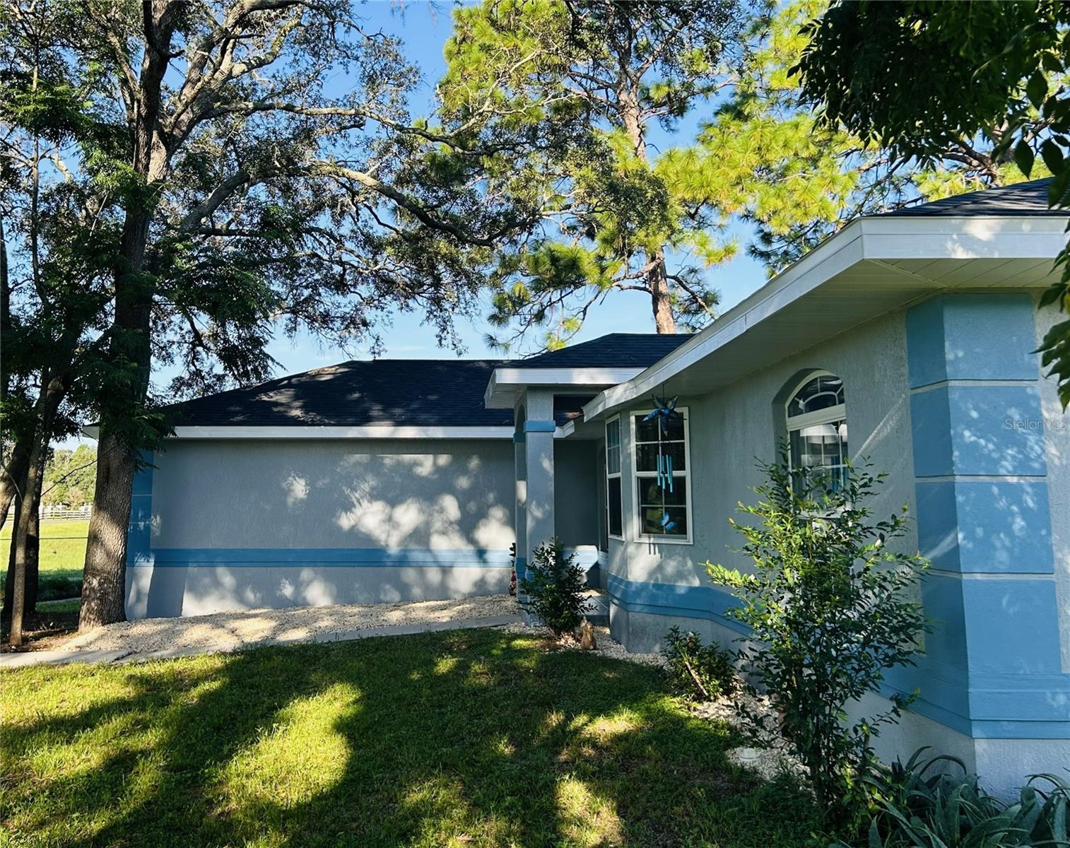 9709 SE SUNSET HARBOR RD — photo 31