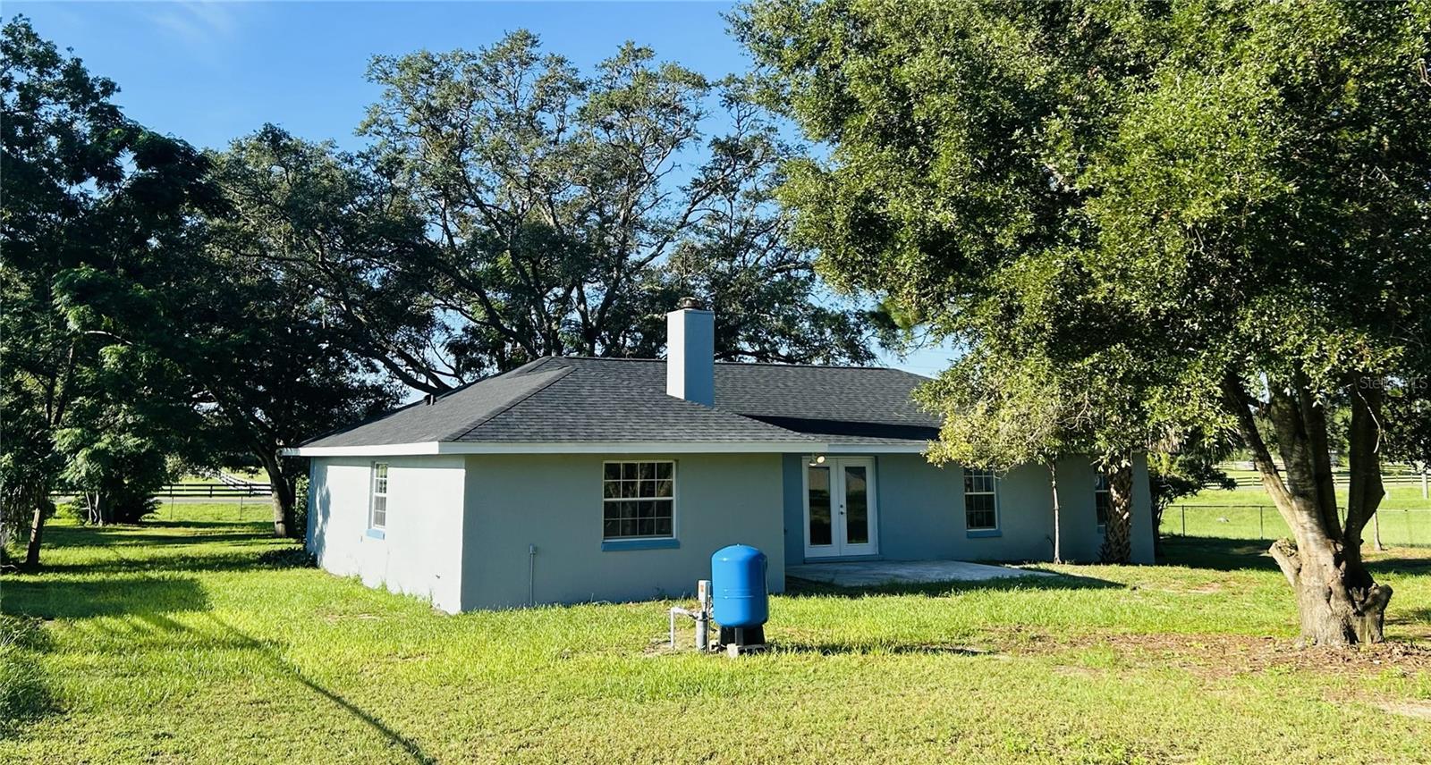 9709 SE SUNSET HARBOR RD — photo 35