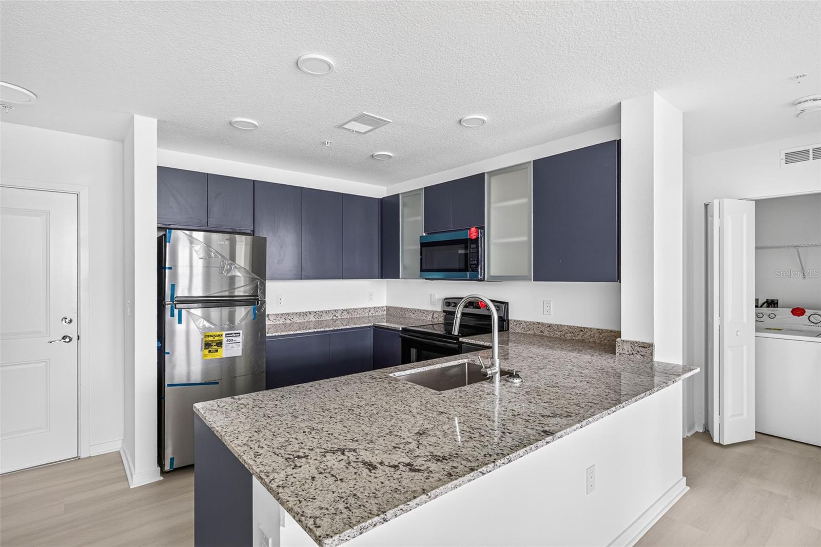 5563 MILLENIA PARK BLVD #517 — photo 3